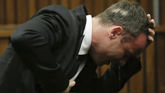 Oscar Pistorius weeps as he listens to evidence in court in Pretoria, South Africa. File image/AP