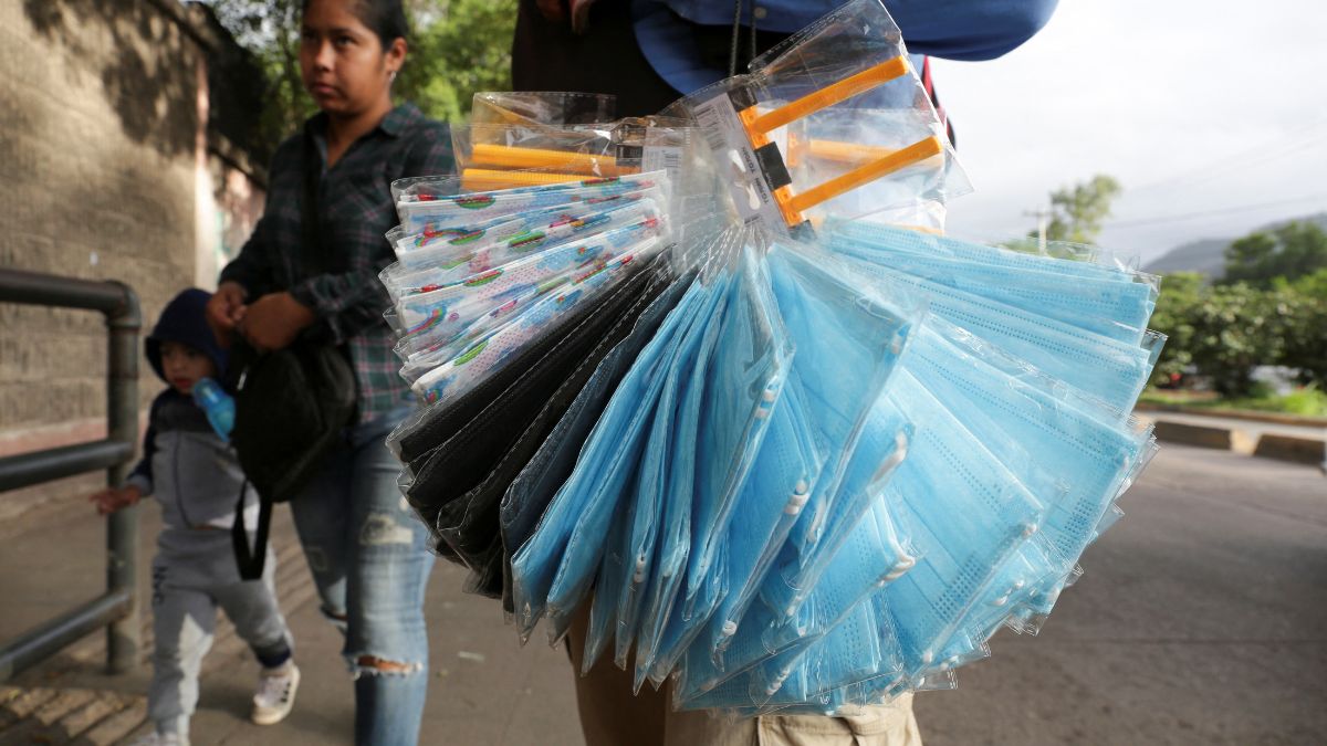 A man sells surgical mask after the Honduran government mandated their use as a preventive measure amid a nationwide surge in respiratory illnesses, including influenza, pneumonia, and COVID-19, in Tegucigalpa, Honduras, July 25, 2025. File Image/Reuters A man sells surgical mask after the Honduran government mandated their use as a preventive measure amid a nationwide surge in respiratory illnesses, including influenza, pneumonia, and COVID-19, in Tegucigalpa, Honduras, July 25, 2025. File Image/Reuters