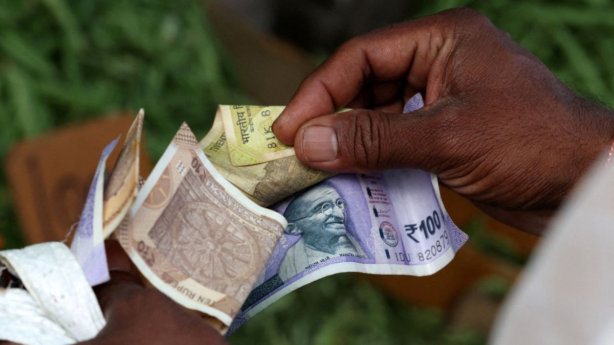 A man counts Indian currency notes at a market in Bengaluru, India, August 1, 2025. File Image/Reuters A man counts Indian currency notes at a market in Bengaluru, India, August 1, 2025. File Image/Reuters