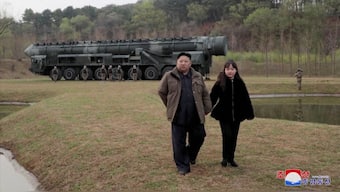 North Korean leader Kim Jong-un and his daughter Kim Ju-ae attend a test launch of a new solid-fuel intercontinental ballistic missile (ICBM) Hwasong-18 at an undisclosed location in this still image of a photo used in a video released by North Korea's Korean Central News Agency (KCNA), April 14, 2023. 