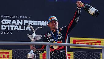 Red Bull Racing's Max Verstappen celebrates on the podium after winning the Italian Grand Prix in dominant fashion. Reuters