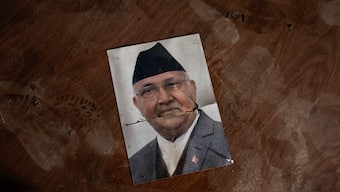 Former Nepal Prime Minister KP Sharma Oli's picture lies on the floor in the Singha Durbar office complex that houses the prime minister's office and other ministries burnt, following the deadly anti-corruption protests in Kathmandu. Reuters