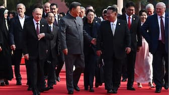 Russian President Vladimir Putin, left, Chinese President Xi Jinping, center, and North Korean leader Kim Jong Un, right, attend a military parade in Beijing, on Wednesday. Image-AP