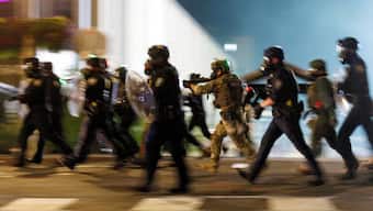 ICE agents charge towards protesters during a protest against the U.S. President Donald Trump administration's immigration policies, outside an ICE detention facility in Portland, Oregon, U.S., September 1, 2025.  File Image- Reuters