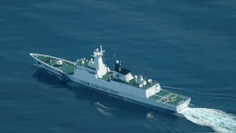 An aerial view of a China Coast Guard ship navigating near the disputed Scarborough Shoal, in the South China Sea, August 13, 2025. File Image/Reuters