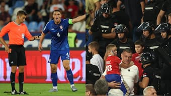 Serbia vs England football match had multiple incidents of disturbances, forcing riot police to intervene. images: Reuters
