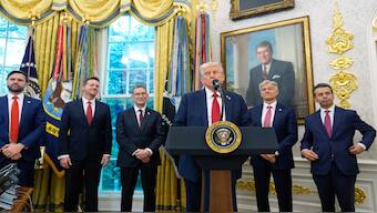 President Donald Trump speaks in the Oval Office of the White House in Washington on Tuesday. AP