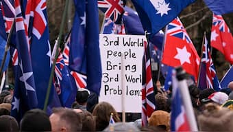 A placard that reads "Third World people bring Third World problems" is seen during a "March for Australia" anti-immigration rally in Melbourne on August 31, 2025. AFP