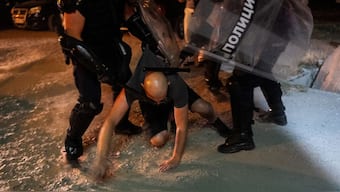 Police units clash with anti-government protesters in the Serbian city of Novi Sad on September 5, 2025, after several thousand rallied seeking early elections. AFP
