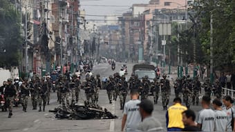 Nepali army soldiers patrol at the road near the Singha Durbar office complex that houses the Prime Minister's office and other ministries, following protests against Monday's killing of 19 people after anti-corruption protests triggered by a social media ban which was later lifted, in Kathmandu, Nepal, September 10, 2025. Reuters