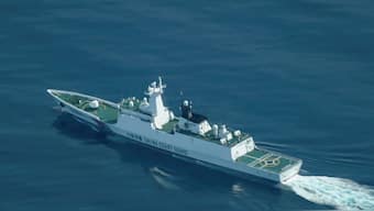 FILE PHOTO: An aerial view of a China Coast Guard ship navigating near the disputed Scarborough Shoal, as Philippine Coast Guard aircraft carrying journalists patrols the area. Reuters