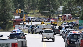 Law enforcement and emergency personnel respond to a shooting at Evergreen High School in Evergreen, Colo., on Wednesday, Sept. 10, 2025.