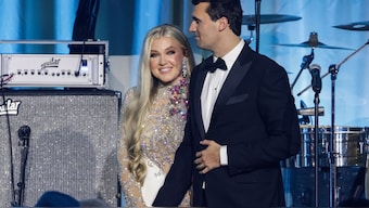 Charlie Kirk (R) and and his wife Erika Lane Frantzve (L) on stage during the Turning Point USA Inaugural-Eve Ball at the Salamander Hotel on January 19, 2025 in Washington, DC. File Photo/AFP