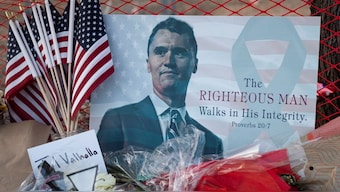 A poster of conservative activist Charlie Kirk is displayed at a memorial following the fatal shooting of Kirk, at the Turning Point USA headquarters in Phoenix, Arizona, US, September 12, 2025. Reuters
