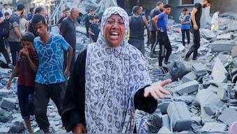 A woman reacts as palestinians inspect the site of an overnight Israeli strike on a house in Gaza City, September 16, 2025. Reuters