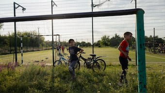 Children play near a public football field in the village in the Dnipropetrovsk region on June 25, 2025, amid the Russian invasion of Ukraine. File Photo/AFP