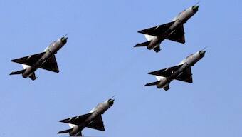 Four MiG-21 FL aircraft fly past for the last time during the 'phasing out ceremony' at the Kalaikunda Air Force Station, in Paschim Medinipur district, West Bengal in December 11, 2013. File Photo/PTI