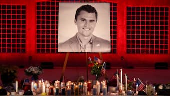 Candles and flowers are placed near an image of Charlie Kirk, during a vigil at Orem City Center Park, after US right-wing activist and commentator, Charlie Kirk, an ally of US President Donald Trump, was fatally shot during an event at Utah Valley University on September 10, in Orem, Utah, US. File Photo/Reuters