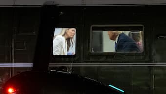 US President Donald Trump speaks with First Lady Melania Trump onboard Marine One after arriving on the South Lawn of the White House in Washington, DC, September 23, 2025, following a trip to New York for the United Nations General Assembly. AFP