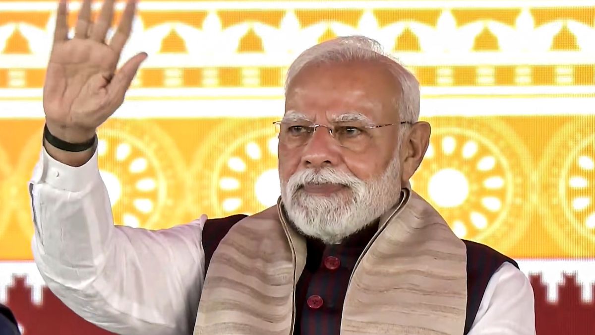 PM Narendra Modi greets the gathering during the foundation stone laying and inauguration of various development projects at a public rally, in Jharsuguda, Odisha. Image Courtesy: @NarendraModi/X via PTI Photo PM Narendra Modi greets the gathering during the foundation stone laying and inauguration of various development projects at a public rally, in Jharsuguda, Odisha. Image Courtesy: @NarendraModi/X via PTI Photo