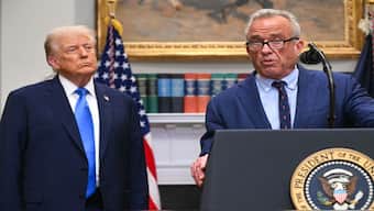 US President Donald Trump looks on as US Secretary of Health and Human Services Robert F Kennedy Jr speaks during an event about autism in the Roosevelt Room of the White House. Kennedy has touted leucovorin as the "answer to autism". AFP