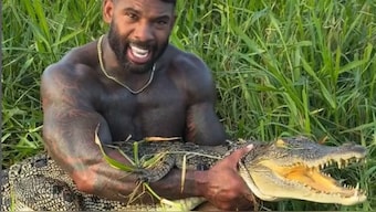 In a viral video, Holston is seen leaping into a waterhole in Far North Queensland and wrestling a freshwater crocodile with his bare hands. Image courtesy: Instagram/ @therealtarzann