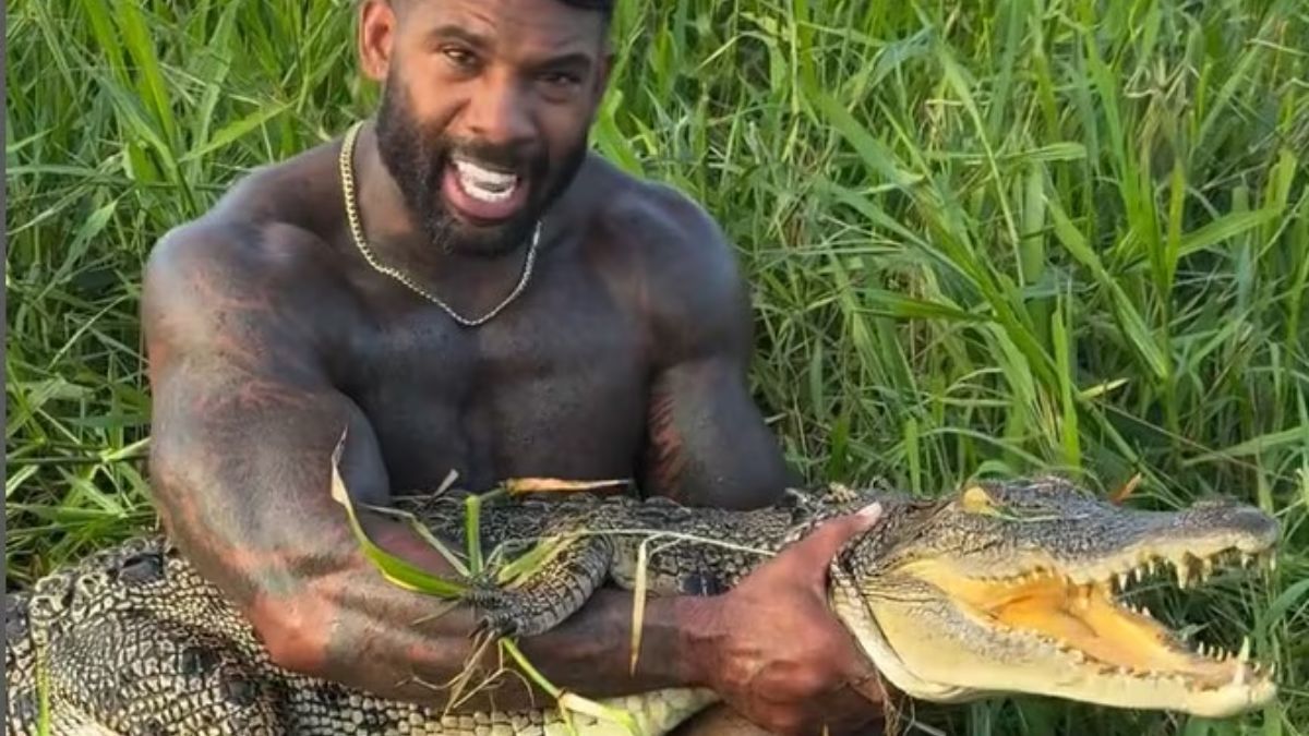 In a viral video, Holston is seen leaping into a waterhole in Far North Queensland and wrestling a freshwater crocodile with his bare hands. Image courtesy: Instagram/ @therealtarzann In a viral video, Holston is seen leaping into a waterhole in Far North Queensland and wrestling a freshwater crocodile with his bare hands. Image courtesy: Instagram/ @therealtarzann
