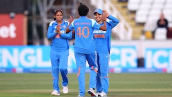 Indian players celebrate after picking up a wicket in a match. Image: Reuters