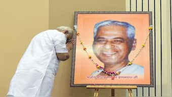 Prime Minister Narendra Modi paying tribute to Laxmanrao Inamdar, a man considered to mentor the PM in his early life. Image Courtesy: @narendramodi/X