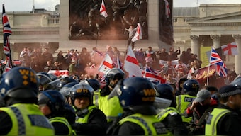 Protesters attend an anti-immigration rally organised by British anti-immigration activist Tommy Robinson, in London, Britain. The protests resulted in the injuries of 26 police officers. Reuters
