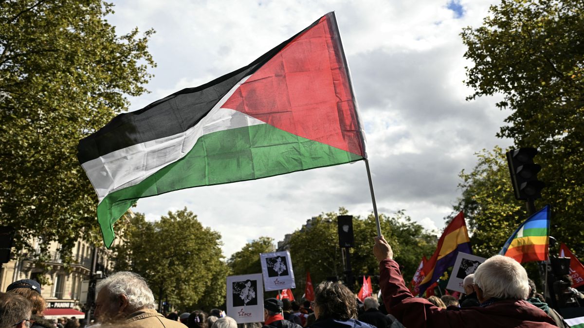 A protester waves a Palestinian flag during a march asking for the "recognition of the State of Palestine and the end of the genocide", in Paris on September 21. AFP A protester waves a Palestinian flag during a march asking for the "recognition of the State of Palestine and the end of the genocide", in Paris on September 21. AFP