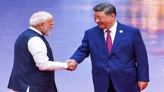 Prime Minister Narendra Modi and China's President Xi Jinping shake hands during the welcome ceremony of the Shanghai Cooperation Organization (SCO) summit in Tianjin. File image/AFP