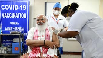Amid the battle against Covid-19, Prime Minister Narendra Modi received his first dose of coronavirus vaccine at Delhi’s All India Institutes of Medical Sciences. Sister P Niveda, from Puducherry, administered Bharat Biotech’s COVAXIN to the prime minister. File image




