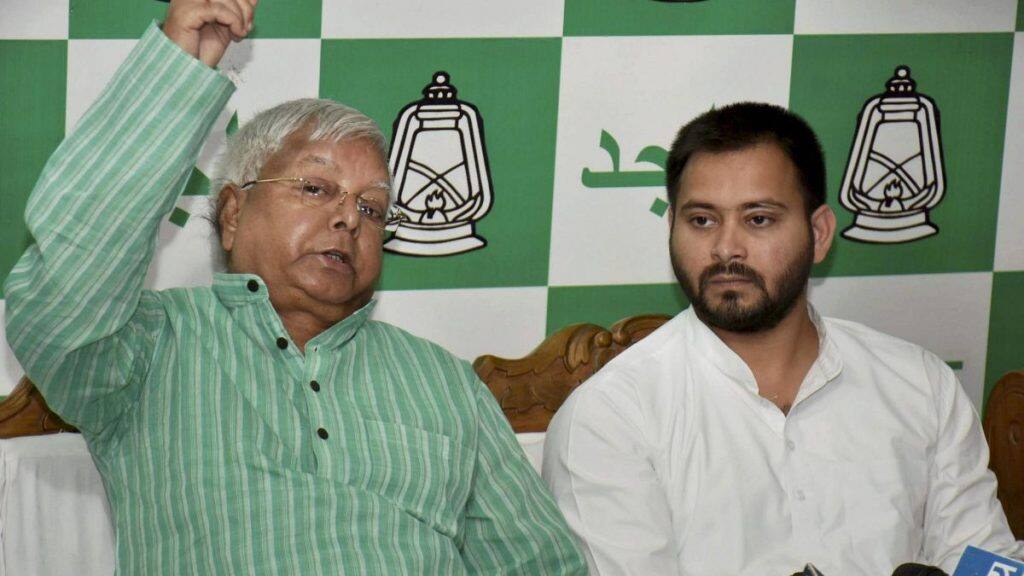 RJD leaders Lalu Yadav and Tejashwi Yadav. File image. PTI