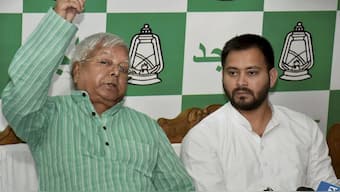 RJD leaders Lalu Yadav and Tejashwi Yadav are facing trial in the alleged IRCTC scam case. File Photo/PTI 