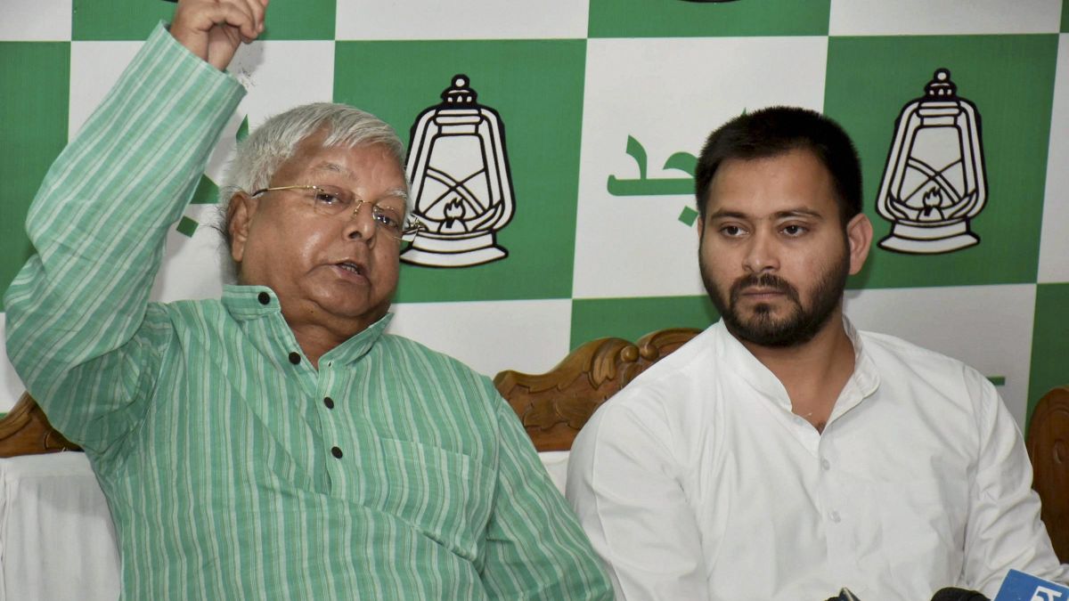RJD leaders Lalu Yadav and Tejashwi Yadav are facing trial in the alleged IRCTC scam case. File Photo/PTI RJD leaders Lalu Yadav and Tejashwi Yadav are facing trial in the alleged IRCTC scam case. File Photo/PTI
