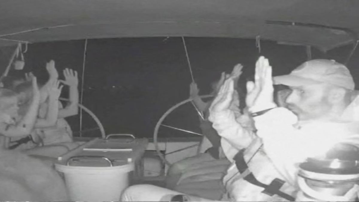 The crew of one of the Gaza-bound vessels with their hands up as they are boarded by Israeli military. Reuters The crew of one of the Gaza-bound vessels with their hands up as they are boarded by Israeli military. Reuters