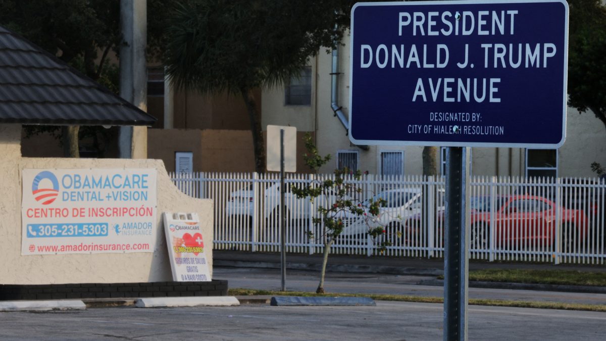 (File) A sign designating Palm Avenue as "President Donald J. Trump Avenue" stands across from a sign advertising "Obamacare" in Hialeah, Florida, US, on December 5, 2024. Reuters (File) A sign designating Palm Avenue as "President Donald J. Trump Avenue" stands across from a sign advertising "Obamacare" in Hialeah, Florida, US, on December 5, 2024. Reuters