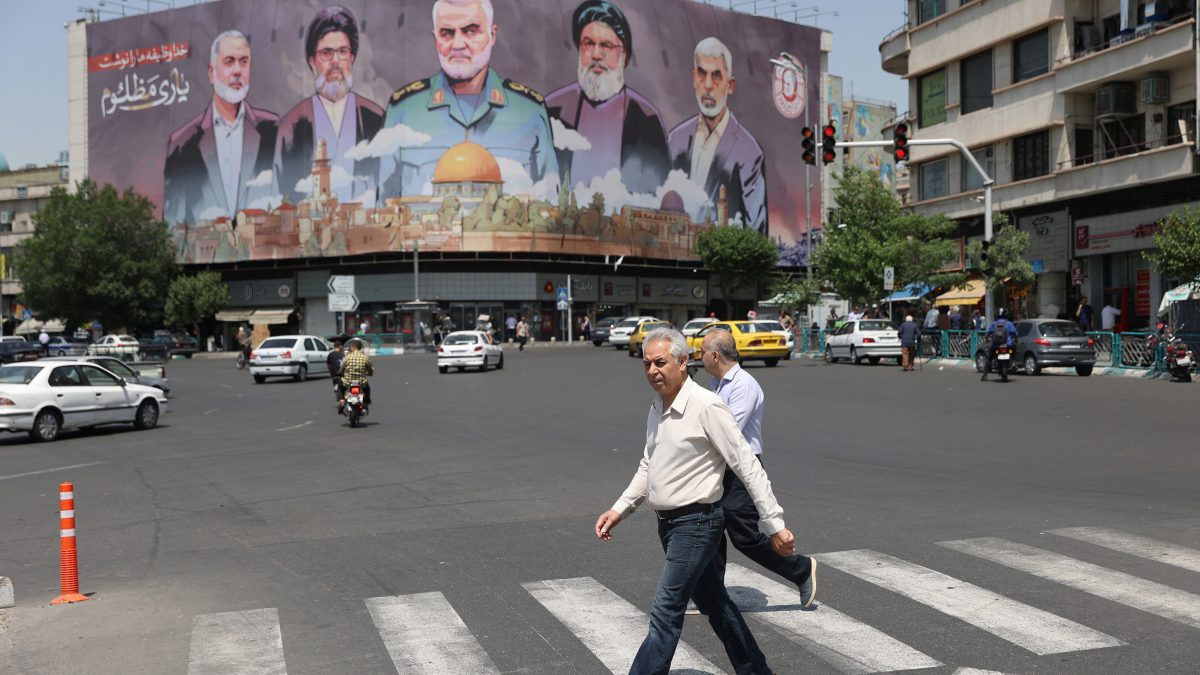 Iranians walk next to a billboard with a picture of late Hamas leader Ismail Haniyeh, senior Iranian military commander General Qassem Soleimani, late Lebanon's Hezbollah leader Sayyed Hassan Nasrallah and late Hamas leader Yahya Al-Sinwar on a street in Tehran, Iran. File image/Reuters  Iranians walk next to a billboard with a picture of late Hamas leader Ismail Haniyeh, senior Iranian military commander General Qassem Soleimani, late Lebanon's Hezbollah leader Sayyed Hassan Nasrallah and late Hamas leader Yahya Al-Sinwar on a street in Tehran, Iran. File image/Reuters