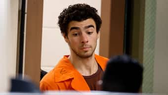 FILE PHOTO: Luigi Mangione attends an extradition hearing at Blair County Court House in Hollidaysburg, Pennsylvania. Reuters