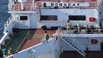 French soldiers on the deck of the Boracay, one of four Russia-linked vessels in the seas near Denmark at the time of the drone sightings. AFP