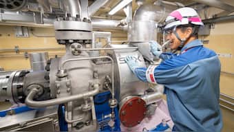 This picture taken on August 6, 2024 shows Masaki Daito, deputy superintendent of the Kashiwazaki-Kariwa nuclear power station, speaking in front of an alternative high pressure core injection system （HPAC) inside the unit 7 reactor building at the Kashiwazaki-Kariwa nuclear power station. AFP file