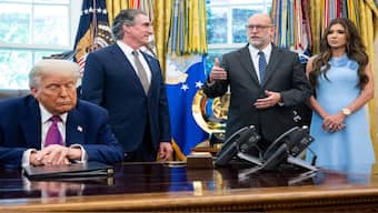 OMB Director Russell Vought (2nd R) speaks about the upcoming wildfire and hurricane seasons alongside US President Donald Trump (L), Secretary of the Interior Doug Burgum (2nd L), and Secretary of Homeland Security Kristi Noem (R) in the Oval Office of the White House in Washington, DC, on June 10, 2025. File Image AFP