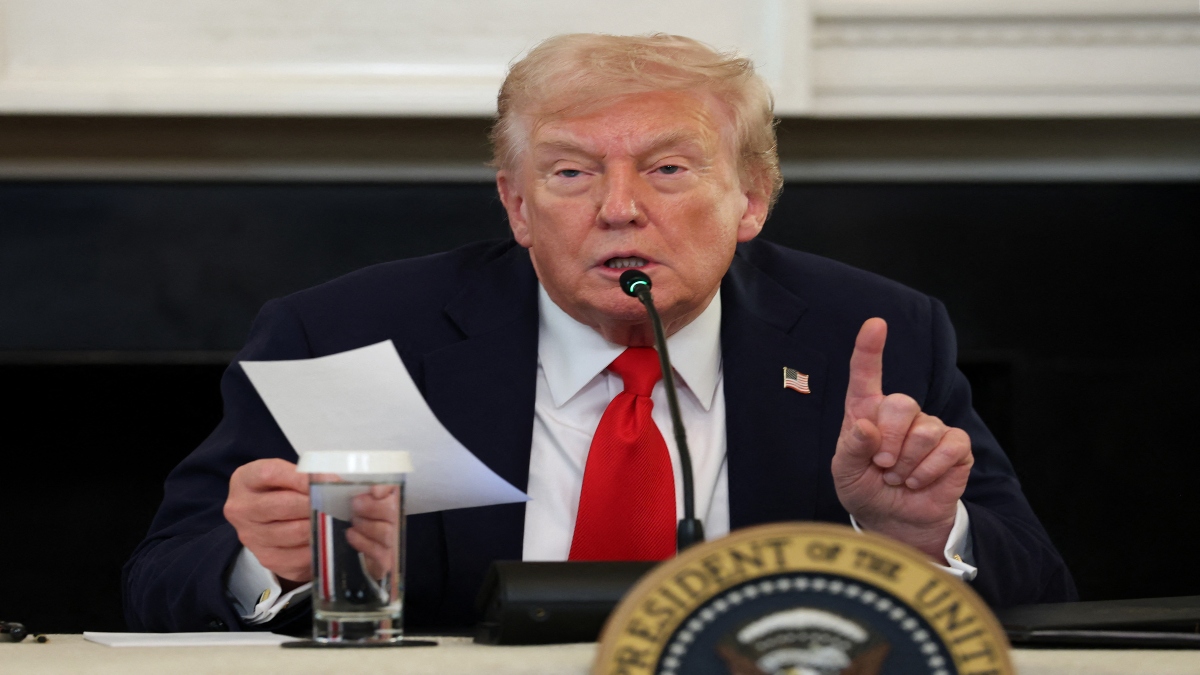US President Donald Trump gestures as he reads a note handed to him by US Secretary of State Marco Rubio he said was regarding Middle East peace talks during a roundtable discussion in the State Dining Room of the White House. AFP US President Donald Trump gestures as he reads a note handed to him by US Secretary of State Marco Rubio he said was regarding Middle East peace talks during a roundtable discussion in the State Dining Room of the White House. AFP