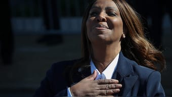 NORFOLK, VIRGINIA - OCTOBER 24: New York Attorney General Letitia James places her hand over her heart to acknowledge supporters while speaking outside the Walter E. Hoffman United States Courthouse following an arraignment hearing on October 24, 2025 in Norfolk, Virginia. James pleaded not guilty to two-counts related to statements she allegedly made about a second home purchased in 2020.   Win McNamee/Getty Images/AFP (Photo by WIN MCNAMEE / GETTY IMAGES NORTH AMERICA / Getty Images via AFP)