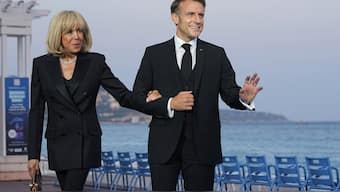 French President Emmanuel Macron and his wife Brigitte Macron pose before a dinner conference in Nice, French Riviera. File image/AP