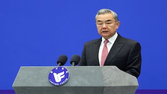 Chinese Foreign Minister Wang Yi delivers his speech at the opening ceremony of the Lanting Forum in Beijing, China, on Monday. Reuters