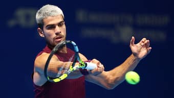 Carlos Alcaraz had suffered an ankle injury in the opening round of the Japan Open but braved the pain and went on to win the ATP 500 tournament in Tokyo. Reuters