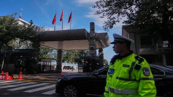 Chinese security personnel stand guard at the entrance to the Jingxi Hotel where the Communist Party's Central Committee is holding its fourth plenum, in Beijing, on October 20, 2025. AP File