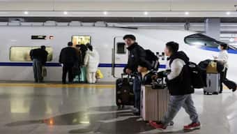 People walk on the platform to board a train at Shanghai Hongqiao railway station in Shanghai, China, on January 24, 2025. Reuters File